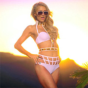 Paris Hilton Posing At Sunset In A White Bikini