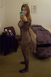 Self Shot Busty Lady In Net Bodystocking